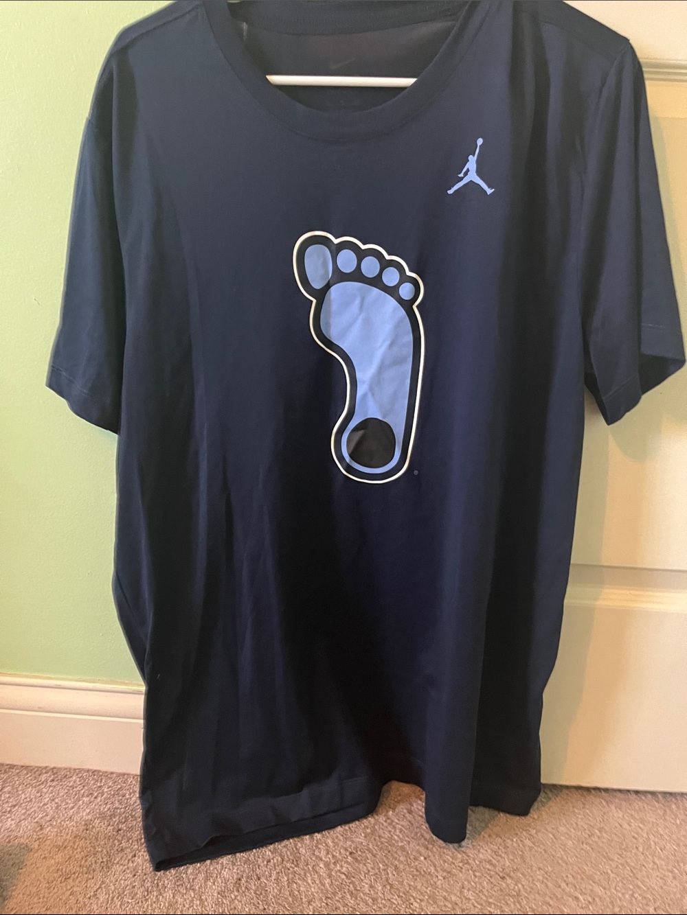 Jordan Men’s Navy Short-Sleeve Tee with Light Blue Foot Graphic